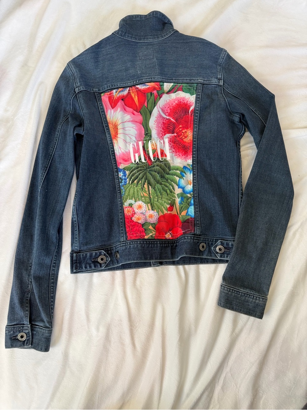 Dark Blue Denim Jacket with Bold Floral Back Panel